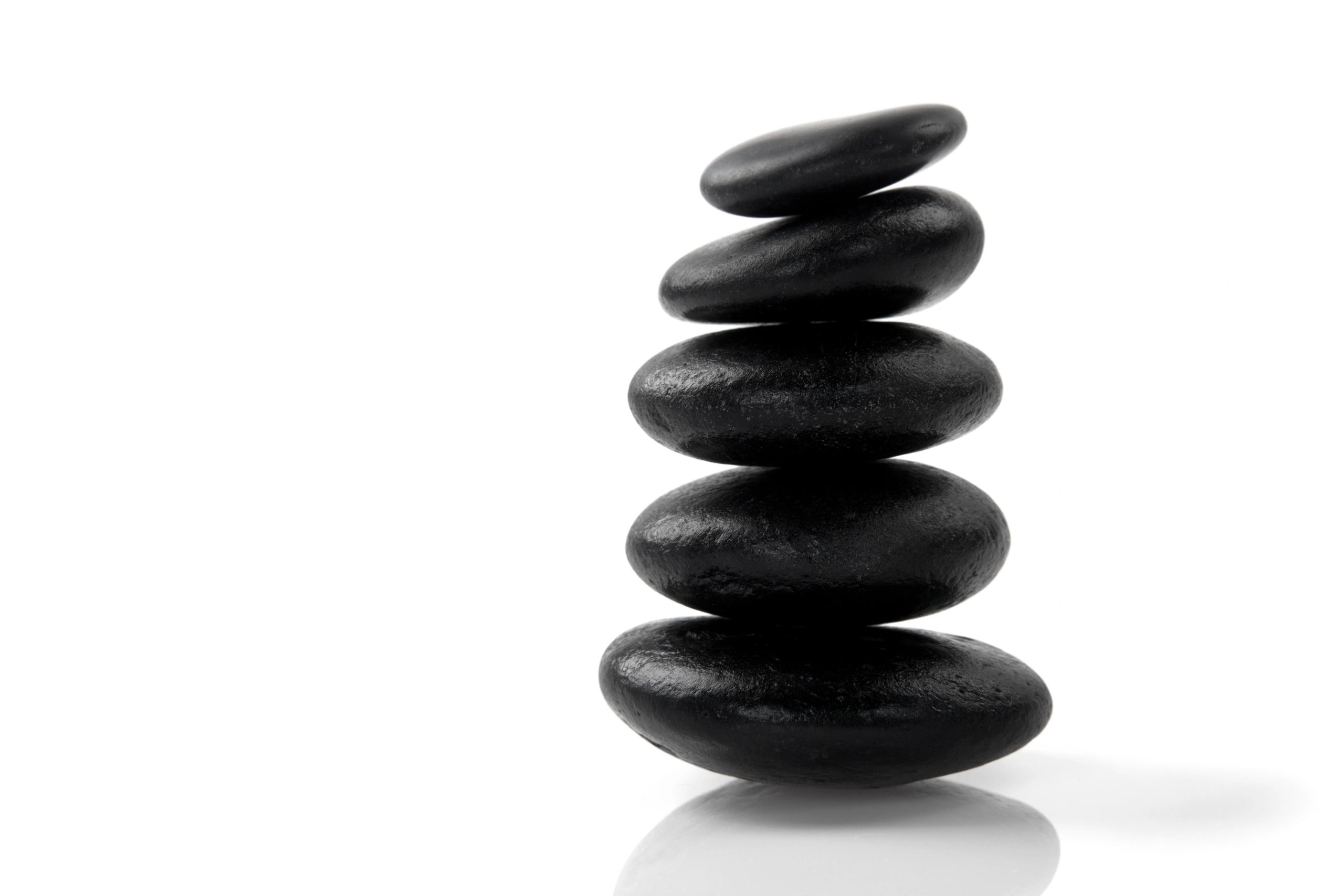 Stacked massage stones for spa therapy